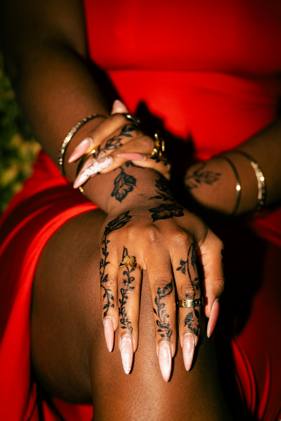Detailed hand styling with rich autumn nail color inspiration